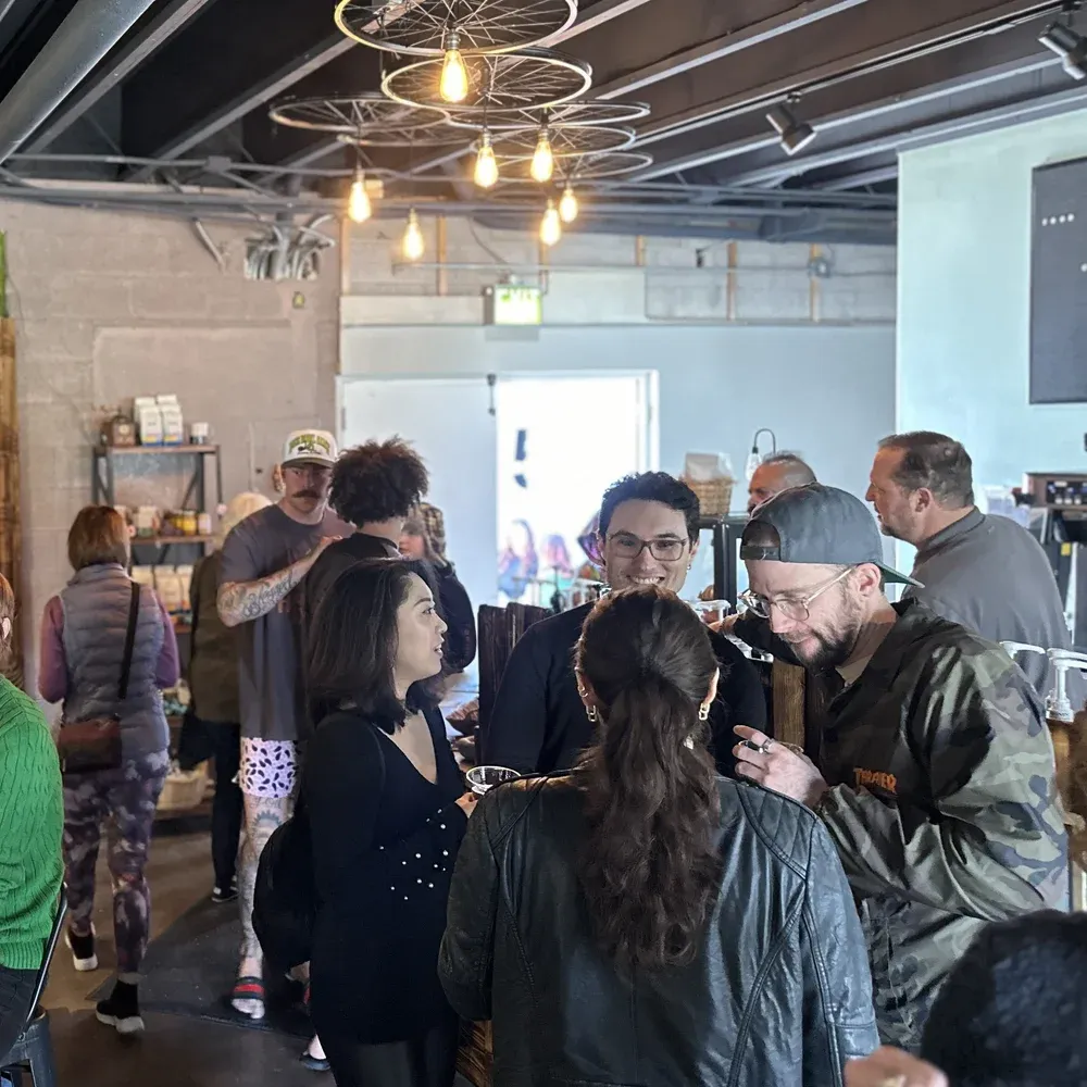 Neighbors gathered and talking inside the Mint and Serif coffee house in Lakewood